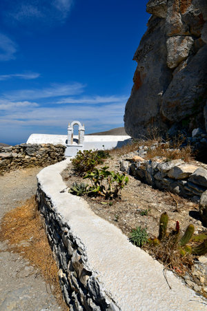 Greece - footpath along the rock to a small white chapel in Chora on Amorgos island, a wonderful Cycladic island in the Aegean Seaの写真素材
