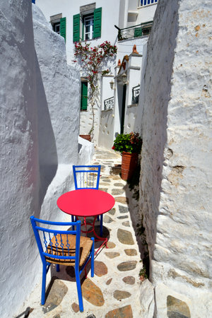 Greece - Colorful seating in the narrow and winding streets of Chora on Amorgos island a wonderful Cycladic island in the Aegean Seaの写真素材