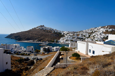 Astypalea, Greece - September 04, 2025: The picturesque little town of Chora with port, windmills and the old castle on top on the Dodescanese island in Aegean Seaの写真素材