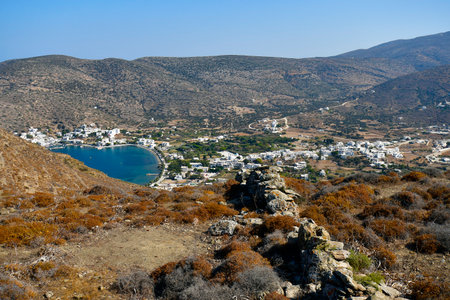 Amorgos, Greece - September 11, 2025: View from the Ancient site of Minoa on Moundoulia Hill, to the village of Katapolaの写真素材