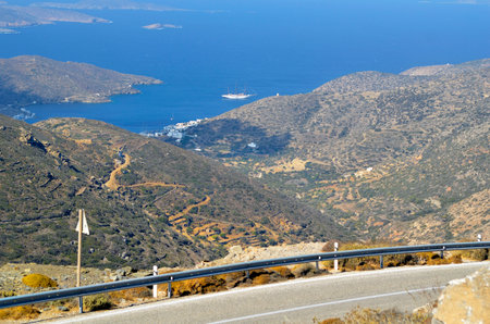Amorgos Greece - September 09, 2025: View from the mountains to the Aegean Sea with the village of Katapolaの写真素材