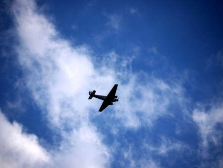 Junkers - JU 52 on cloudy sky over Berlin