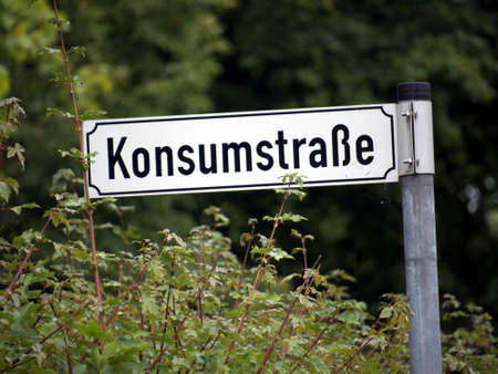 Street sign in Kummersdorf, Germany: consumption Streetの写真素材