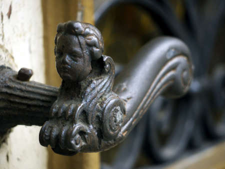 ornate door handle with female headの写真素材