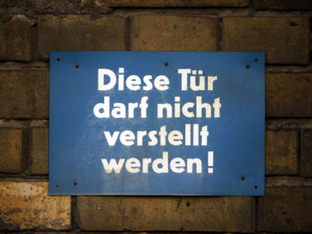 Sign on a brick wallの写真素材