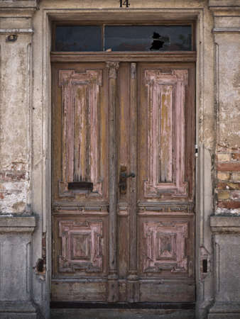 brown wooden door in an old buildingの写真素材