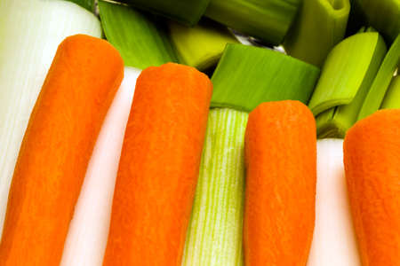 Carrots and leeks prepared for cooking.の写真素材