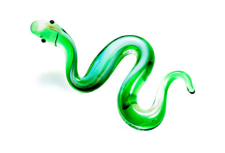 Glass green snake on a white backgroundの写真素材