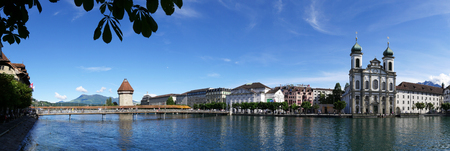 Lucerne with chapel bridge, jesuit church and mount rigi in the backgroundのeditorial素材