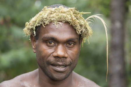 Tanna, Republic of Vanuatu, July 12th, 2014, Portrait of an indigenous man with traditional headdressのeditorial素材