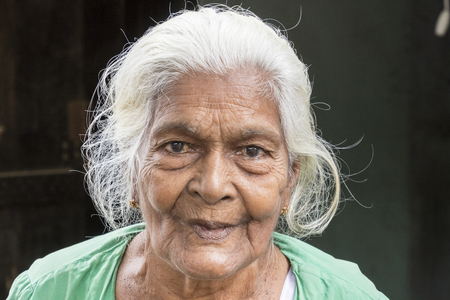 TISSAMAHARAMA, SRI LANKA - February 19, 2017: Grandmother on a market in Tissamaharama, EDITORIALのeditorial素材