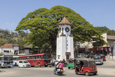 Kandy, Sri Lanka - February 12, 2017: City traffic, Clock tower in downtown Kandyのeditorial素材