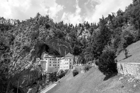 Postojna, Slovenia - July 11 2017: Predjama; Castle at the cave mouth in Postojna, Slovenia in springtimeのeditorial素材