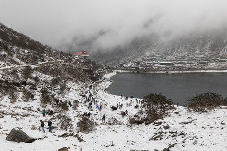 SIKKIM, INDIA, March 9 2017: Tourists at the Tsomgo (Changu) Lake in Sikkim. It is a sacred natural glacial lake on top of mountain in Gangtok East Sikkim.のeditorial素材