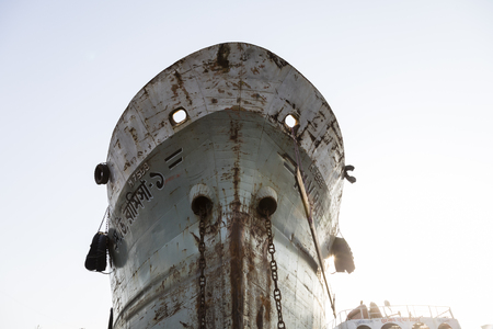 Dhaka, Bangladesh, February 24 2017: Bow of an old rusty ferry on the Buriganga River in Dhaka Bangladeshのeditorial素材