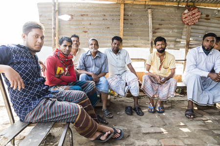 Dhaka, Bangladesh, February 24 2017: Taxi drivers take a break and wait for passengers on a ship dock in Dhaka Bangladeshのeditorial素材