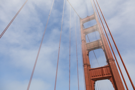 Tower of the Golden Gate Bridge in the fog, San Francisco, California, USAの写真素材