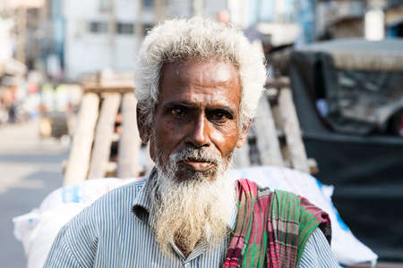 Khulna, Bangladesh, February 28 2017: Portrait of an old Muslim in the streets of Khulna