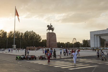 Bishkek, Kyrgyzstan August 9 2018: The residents of Bishkek meet at sunset in the square in front of the Historical Museum for leisure activitiesのeditorial素材