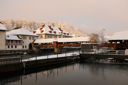 Lucerne, Switzerland, February 4, 2019: Lucerne with reuss river and wooden bridge called spreuer bridge on a wonderful winter morningのeditorial素材