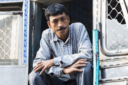 Burimari, Bangladesh, March 3 2017: Truck driver waiting in Burimari, a border town between Bangladesh and India on the clearanceのeditorial素材