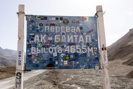 Ak-Baital, Tajikistan, August 22 2018: Sign of Ak-Baital pass on the Pamir Highway, Gorno-Badakhshan...