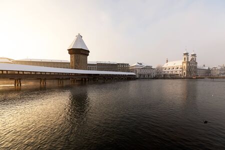 Lucerne, Switzerland, February 4, 2019: Lucerne with wooden bridge called chapel bridge and jesuit church on a wonderful winter morningのeditorial素材