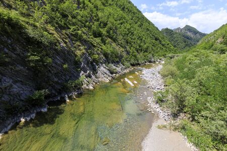 Mountainous landscape with green forests and clear rivers in the northern Dinaric Alps in Albania