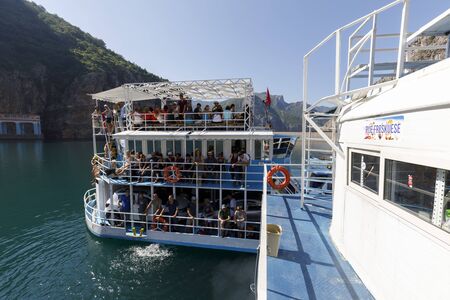 Koman, Albania, July 7 2019: Ferry is loaded with cars and passengers in Koman, Komani lake, a 35km long reservoir in the dinaric alpsのeditorial素材