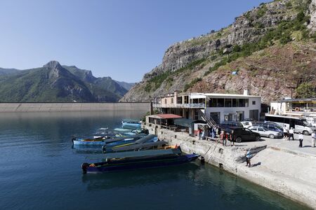 Koman, Albania, July 7 2019: Looking back to the ferry dock in koman. In the background you can see the dam of the komani lake, a 35km long reservoir in the dinaric alpsのeditorial素材