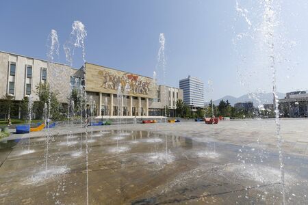 Tirana, Albania, July 8 2019: Water fountains in front of the building of the National Museum of History in the city center on Skanderbeg Square in Tiranaのeditorial素材