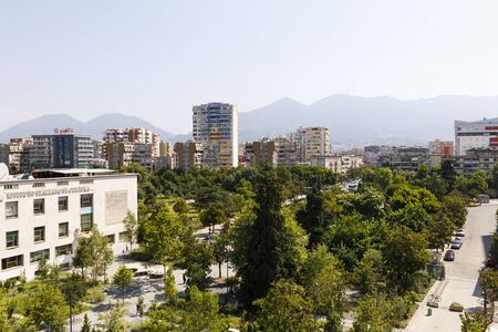 Tirana, Albania, July 8 2019: Aerial view of the opera on the left with mountains in the background in Tiranaのeditorial素材