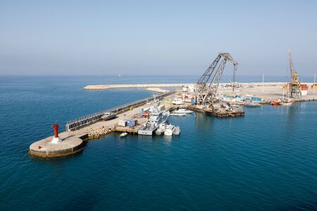 Durres, Albania, July 4 2019: Industrial port in Durres Albania with loading cranes and containers