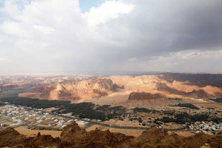 View towards Al Ula, an oasis in the middle of the mountainous landscape of Saudi Arabiaの写真素材