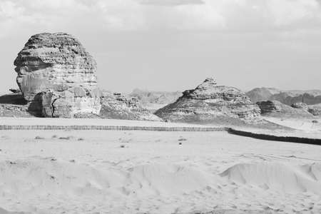 Typical landscape with eroded mountains in the desert oasis of Al Ula in Saudi Arabiaの写真素材