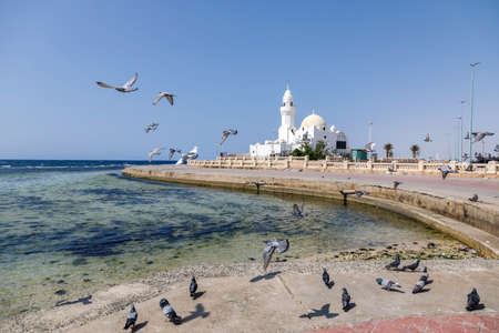 Small white mosque built on the Corniche right on the shores of the Red Sea in Jeddah, Saudi Arabiaの写真素材