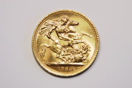 One british pound sterling gold, old type, 1964の写真素材