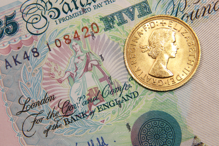 One british pound gold with banknote, old type, 1964のeditorial素材