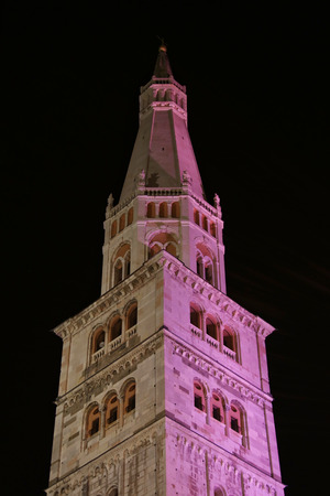 Modena, Emilia Romagna, Italy, Ghirlandina tower with pink illumination, Unesco world heritage siteのeditorial素材