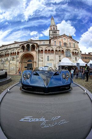 MODENA, ITALY, May 16 2019 - Motor Valley Fest exhibition, Pagani Zonda Barchetta and the cathedral of Modenaのeditorial素材