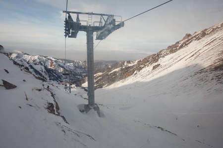 The cable car in the snowy mountains Chimbulak photo for youの写真素材