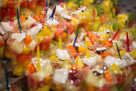 Fruit salad in plastic cups photo for youの写真素材