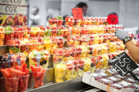 Fruit salad in plastic cups photo for youの写真素材