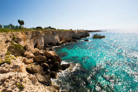 Stone cliff in a beautiful blue sea Cyprus photo for youの写真素材