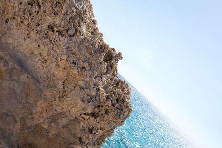 Stone cliff in a beautiful blue sea Cyprusの写真素材