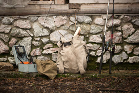 Fishing rods and a backpack for vacationの写真素材