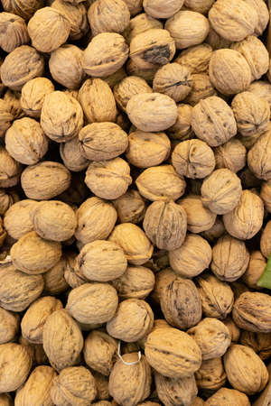 Primeur fruits and vegetables. Detail of nuts at a greengrocerの写真素材