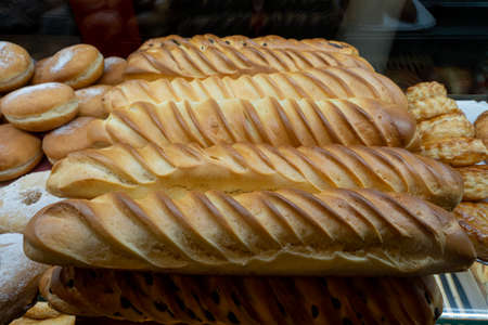 Artisan baker and pastry chef. Detail of breads in a bakery