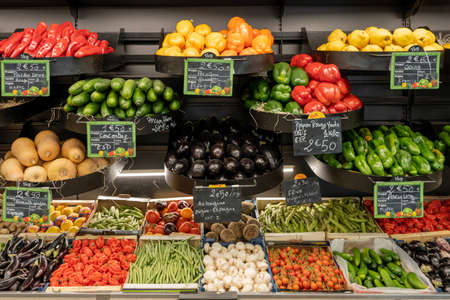 Gennevilliers, France - 01 21 2022: Primeur fruits and vegetables. Detail of mixed tomatoes at a greengrocerのeditorial素材