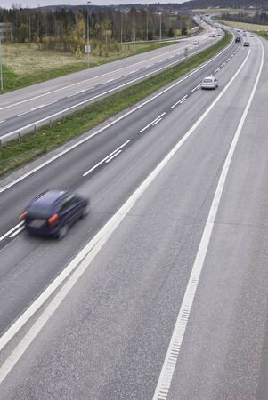 a car driving on a highway. Picture taken on road E6 towards Oslo, Norway